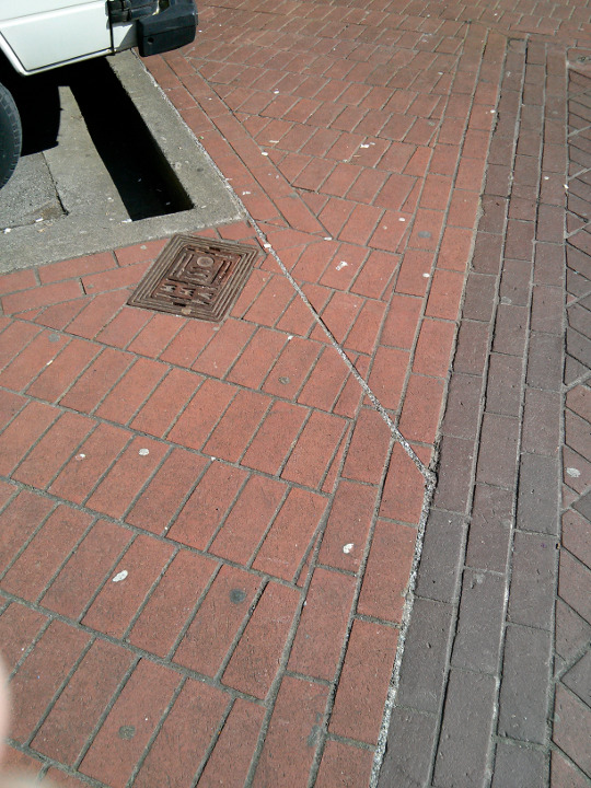 Surface Inlaid Fiber, grey grouting through existing brickwork only visible evidence of fiber.